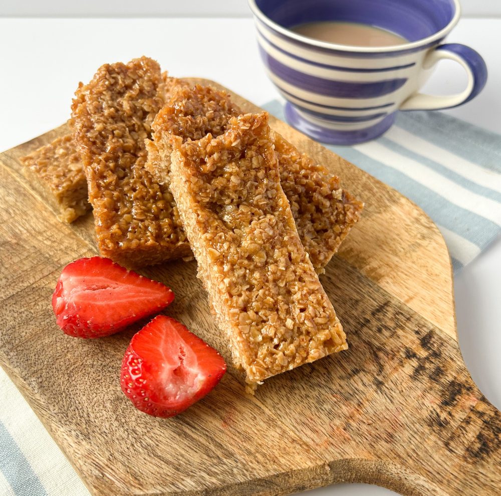 sliced traditional all butter flapjack on chopping board