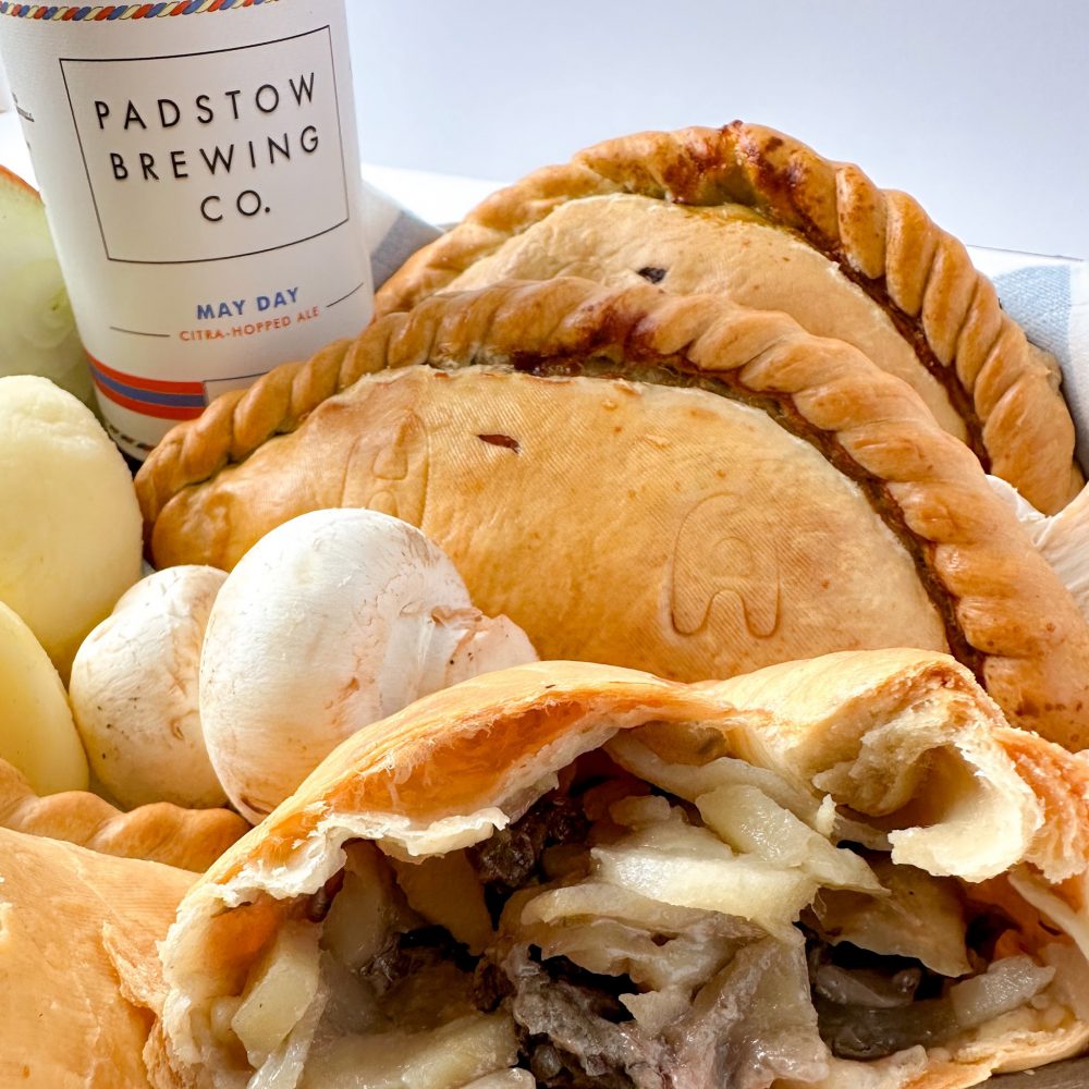 Steak and Padstow Ale Pasties close up on board